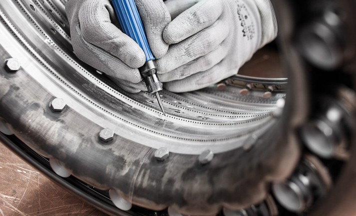 Machining with custom manufactured tungsten carbide burrs.